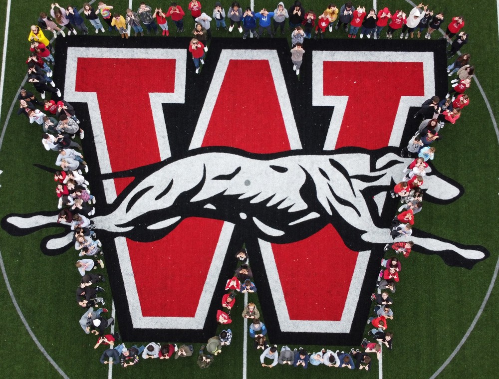 WMS students at football field logo